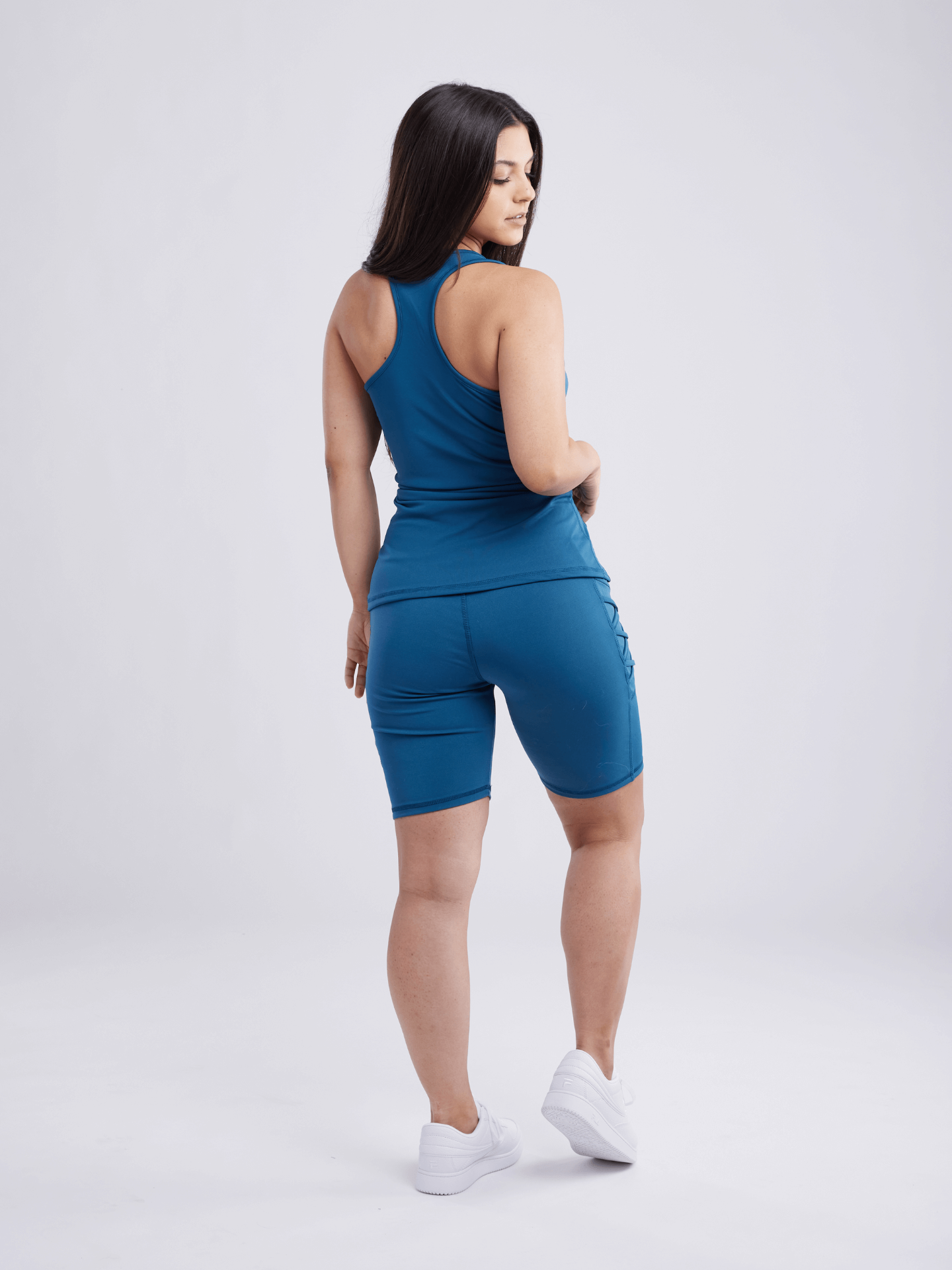 High-Waisted Workout Shorts with Pockets & Criss Cross Design - DIVINE